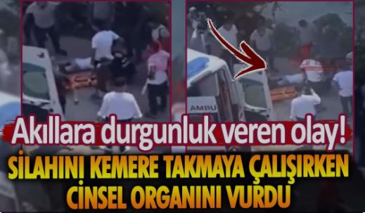 Tabancasını ön kemerine takmaya çalışırken cinsel organını vurdu